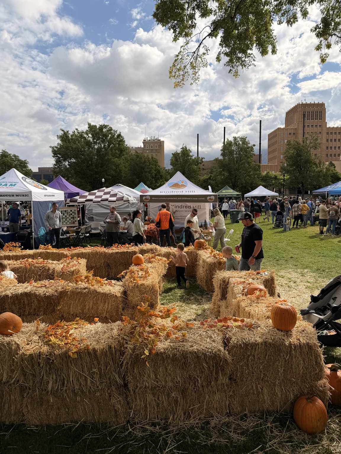 Hay bales, pumpkins, and festival tents in Ogden